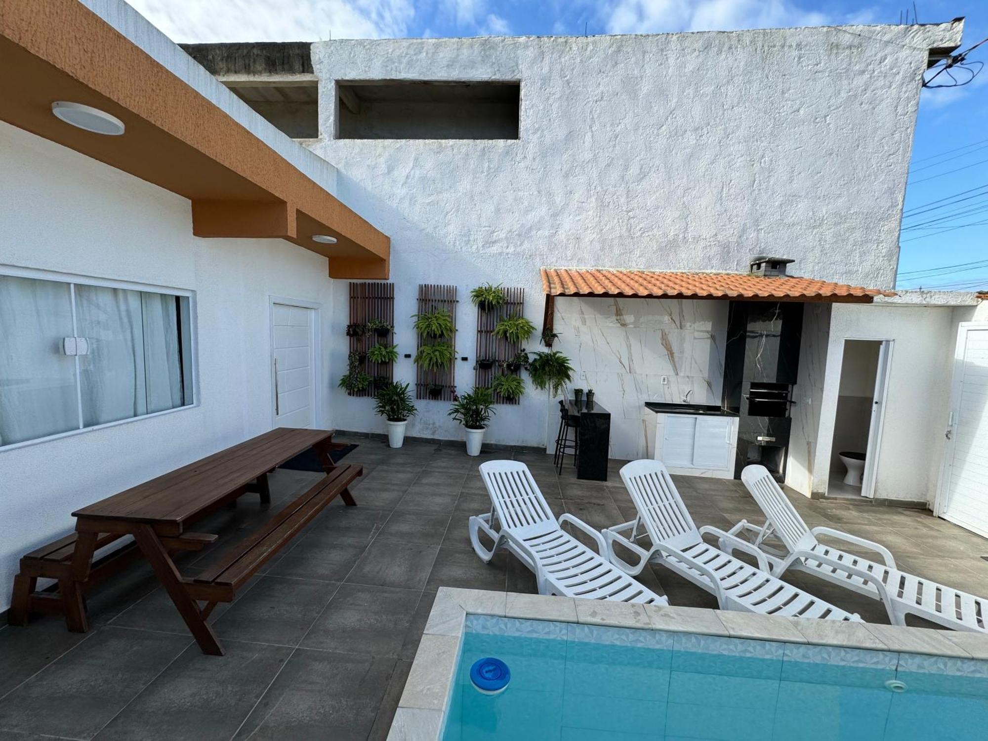 Вилла Casa Compacta Com Piscina Гуаружа Экстерьер фото