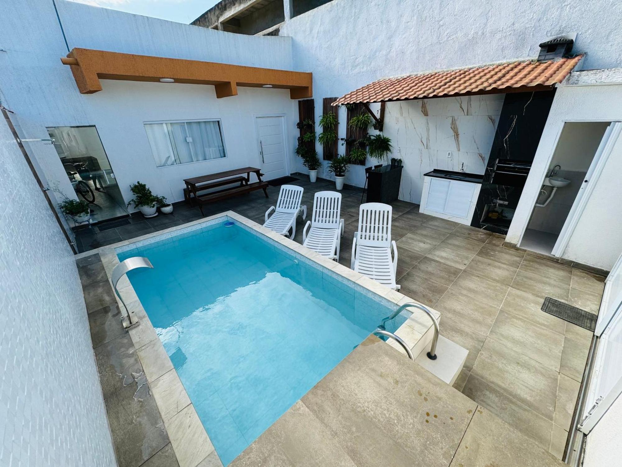 Вилла Casa Compacta Com Piscina Гуаружа Экстерьер фото